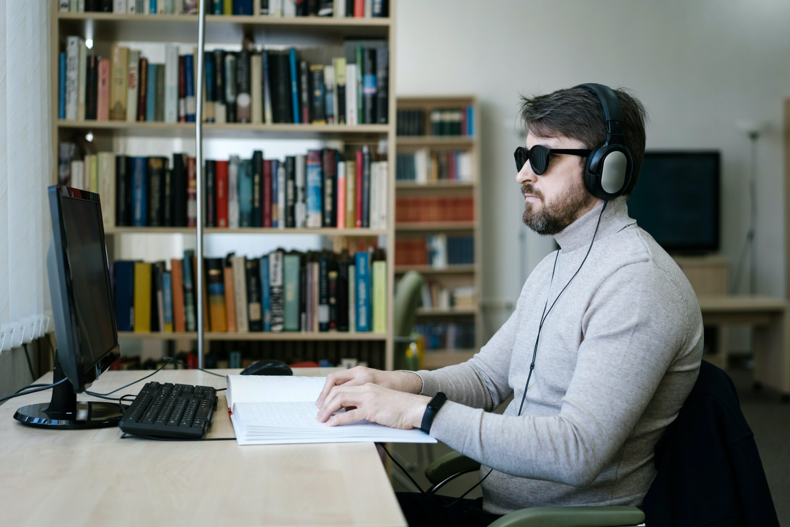 A blind man using a screen reader